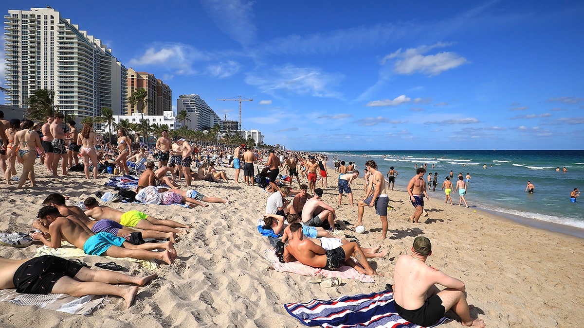 Generic spring break crowd, dengue fever cases rising causing alarm for spring break participants
