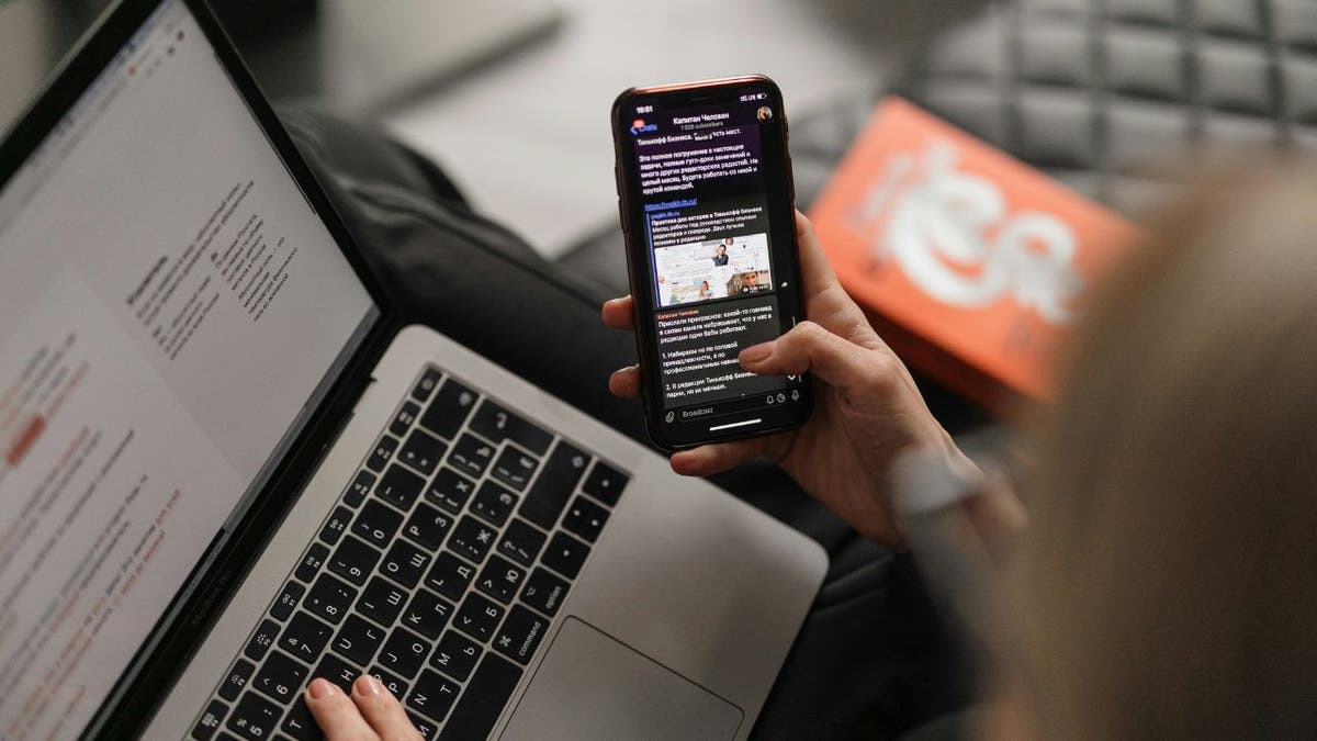 woman looking at phone