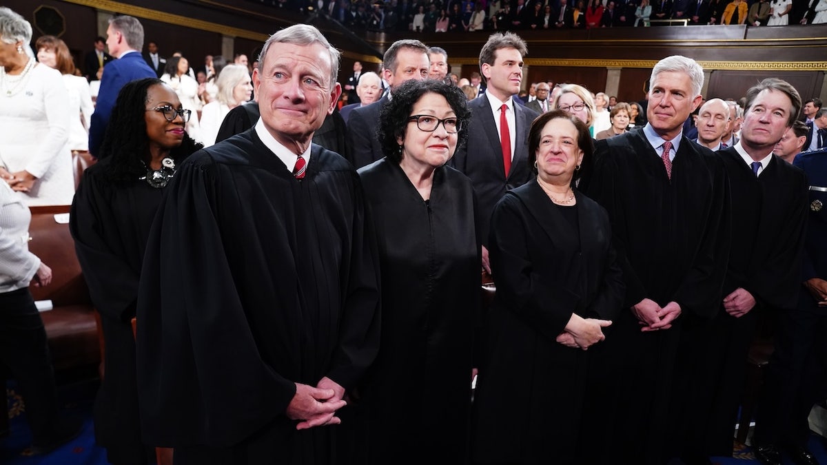 WASHINGTON, DC - MARCH 7: U.S. Supreme Court Chief Justice John Roberts (L) and Associate Justices (L-R) Sonia Sotomayor, Elena Kagan, Neil Gorsuch and Brett Kavanaugh stand on the House floor ahead of the annual State of the Union address by U.S. President Joe Biden before a joint session of Congress at the Capital building on March 7, 2024 in Washington, DC. This is Biden's final address before the November general election. (Photo by Shawn Thew-Pool/Getty Images)