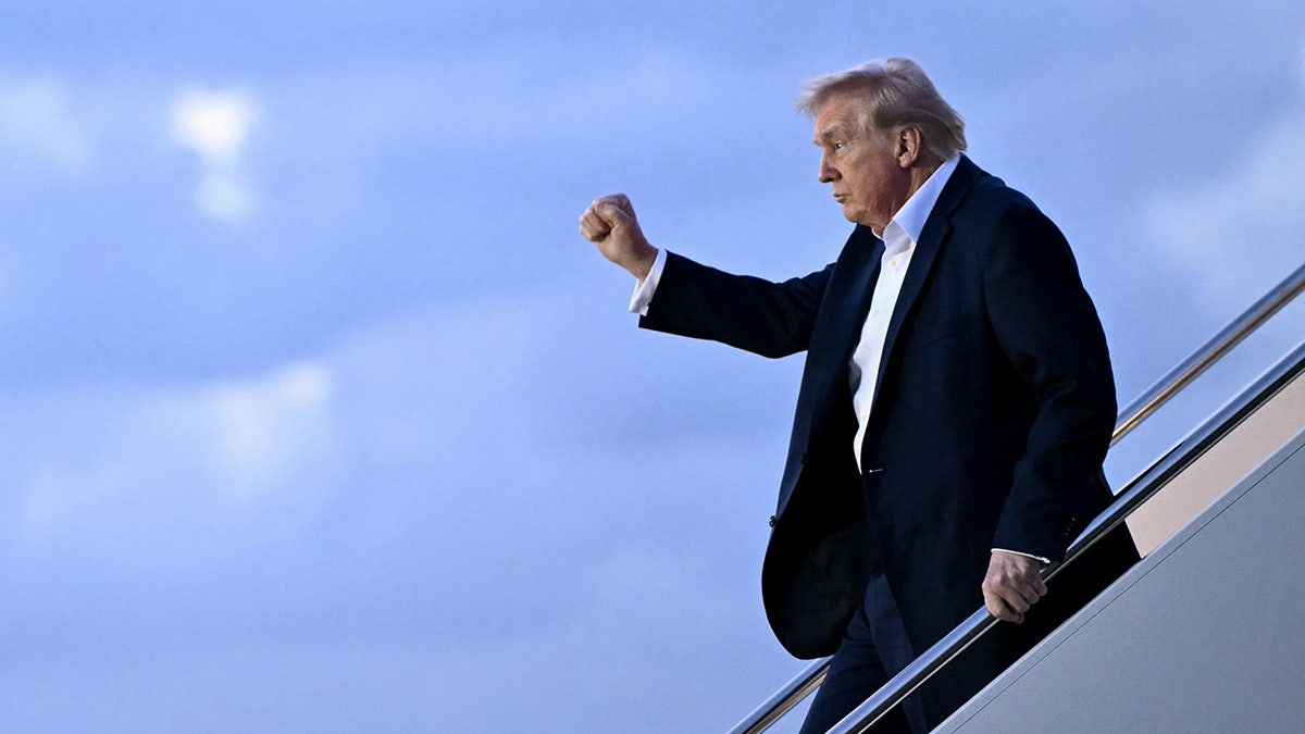 Trump getting off Air Force One