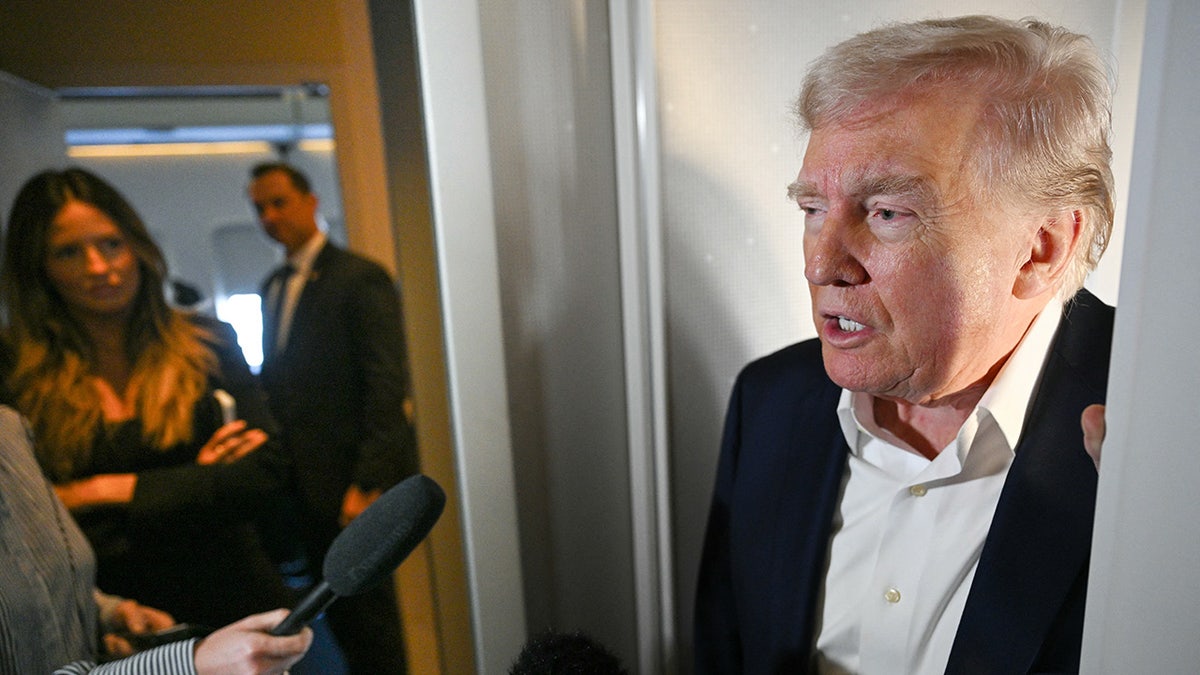 Trump speaking to reporters on Air Fore One