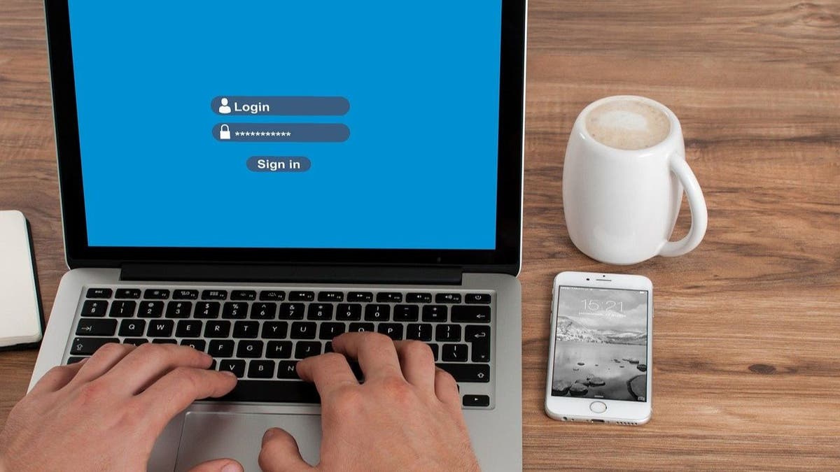 Illustration of a person signing into their laptop.