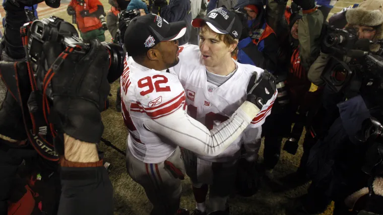 Giants legends Eli Manning, Michael Strahan feuding over $750 million