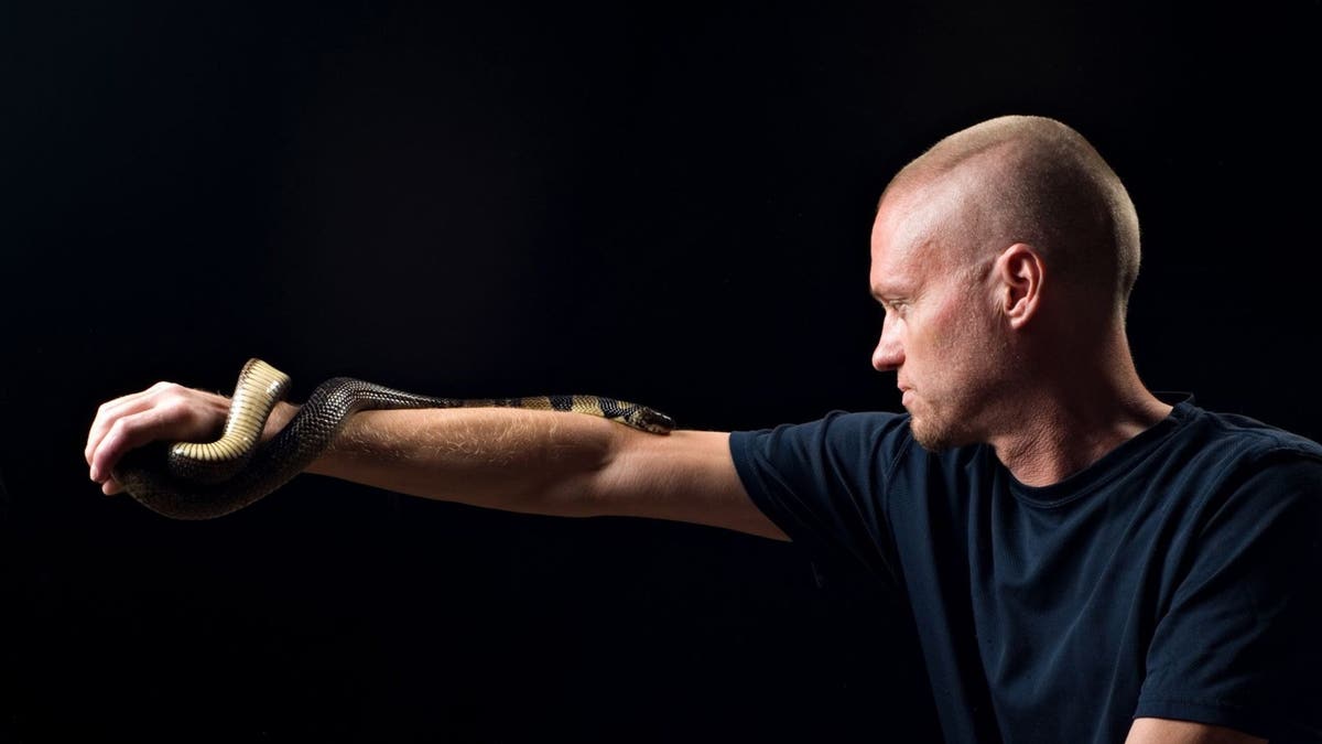 Tim Friede with snake