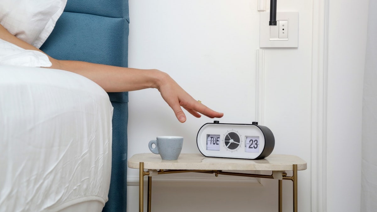 Snooze button alarm clock