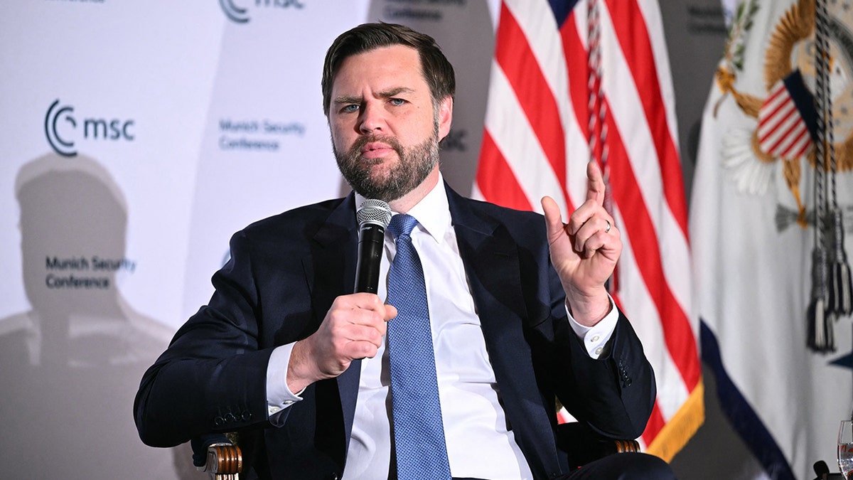 Vance on stage in DC