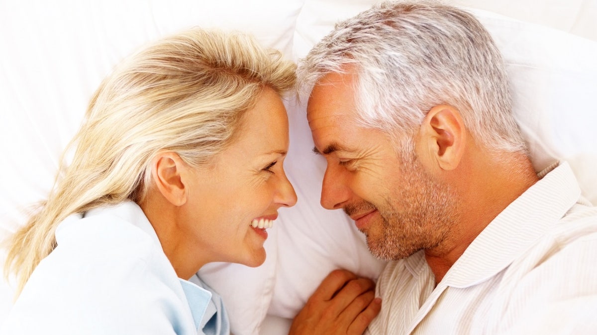 Mature couple cuddling