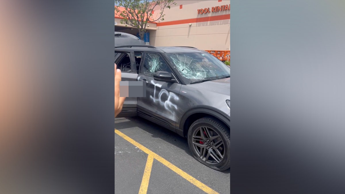 FOX LA's work SUV was damaged by anti-ICE protesters in Paramount, California. 