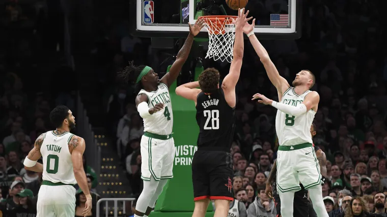 Should the Celtics keep Kristaps Porzingis over Jrue Holiday?