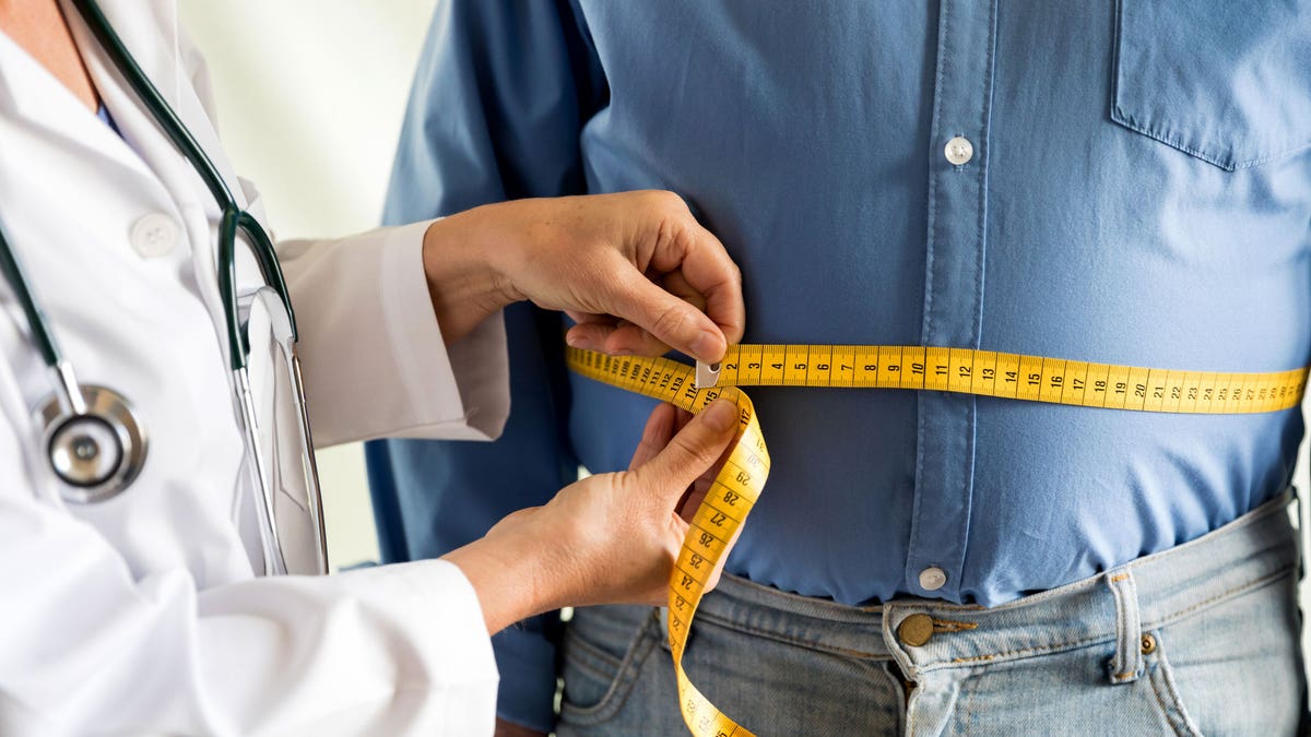 Man with obesity at doctor