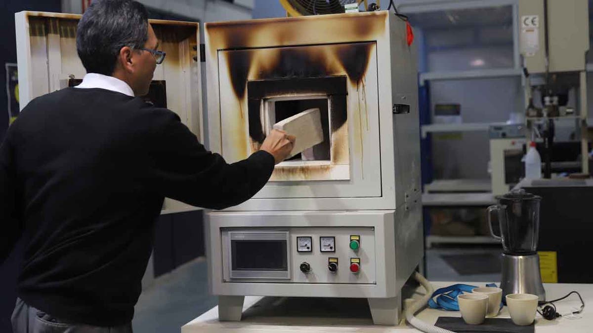 Firing bricks made from coffee waste.