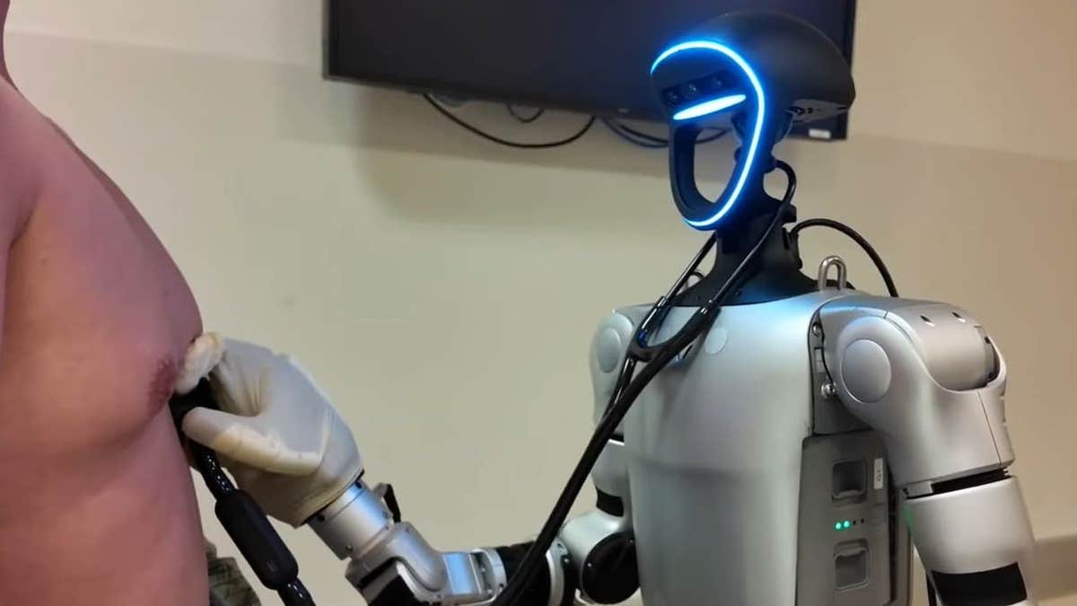 The Unitree G1 humanoid robot performing a physical exam.