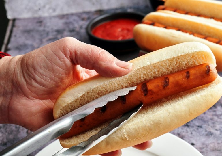 Just one hot dog a day could raise disease risk, study suggests, but some cite caveats