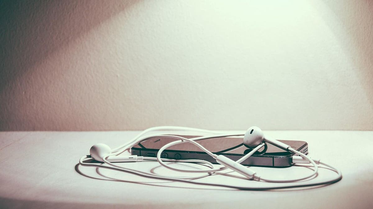An image of an old phone on a desk.