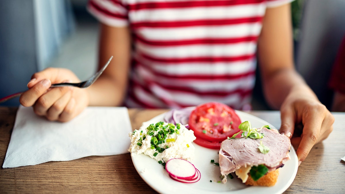 Woman enjoying. a simple meal