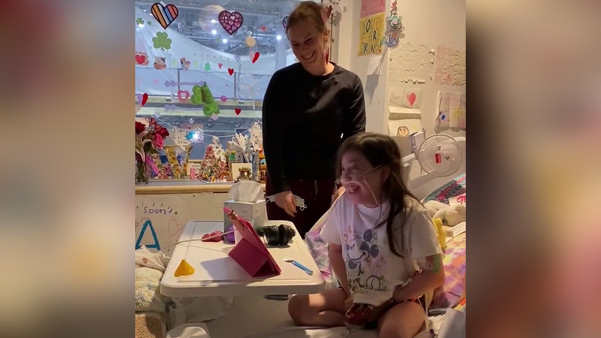Ava Cooper surprising her father with heart transplant news