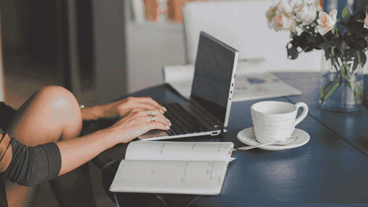 A woman viewing her 401(k) info on her laptop.