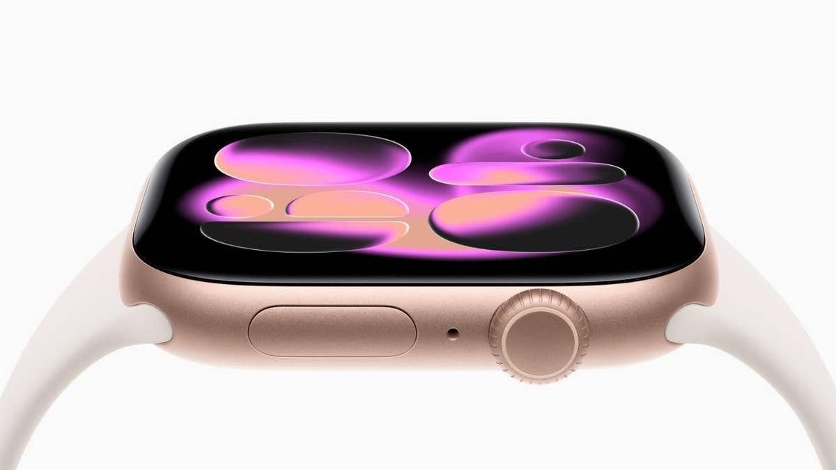 Apple Watch with pink and purple bubbles on screen