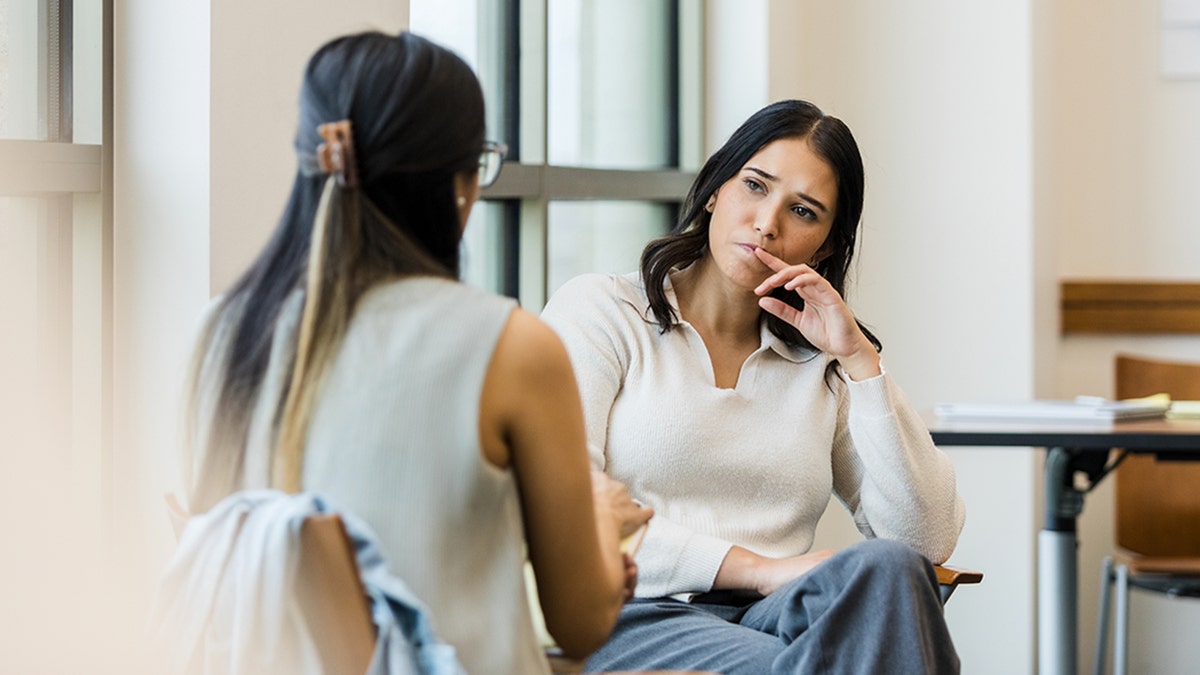 woman and therapist in a session