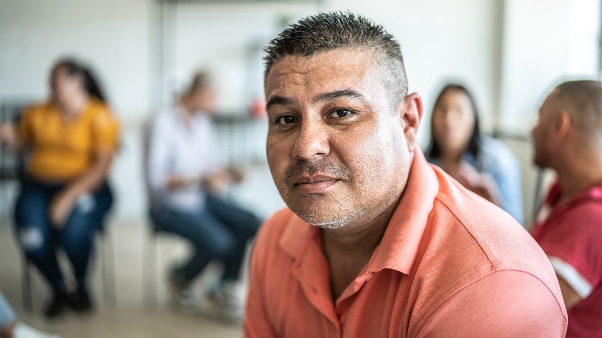 man in a social circle