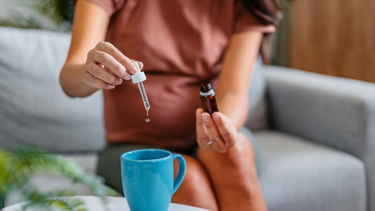 Pregnant woman using cannabis oil