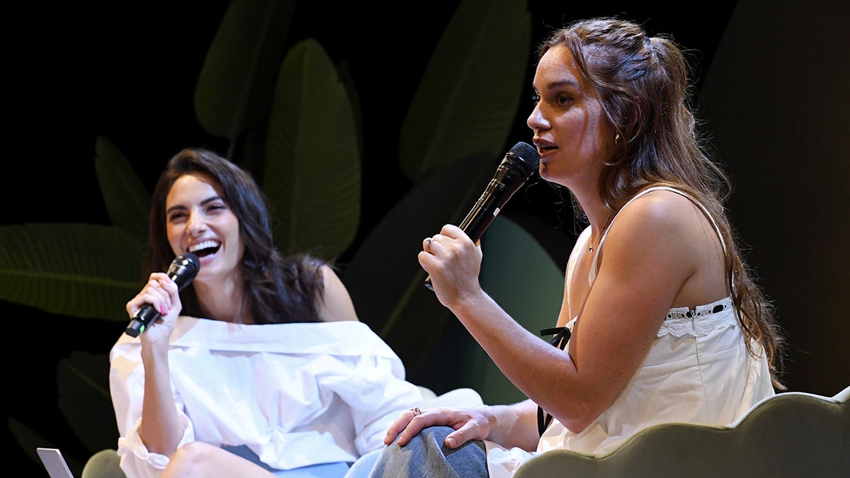 paige desorbo and hannah berner on stage