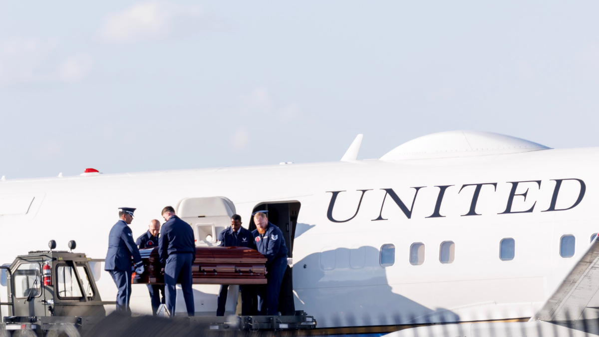 The casket of Charlie Kirk is removed from Air Force Two