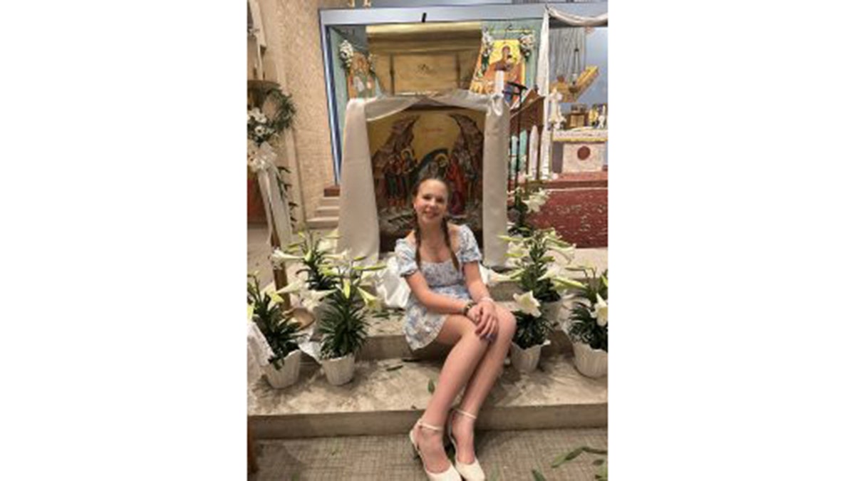 sophia forchas sitting at an altar