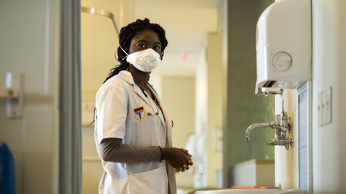 Health care worker wearing mask
