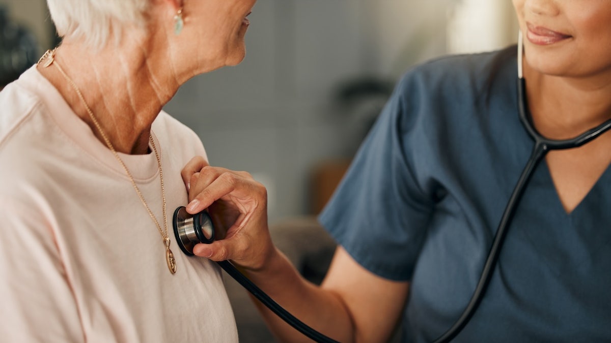 Older woman heart health at doctor