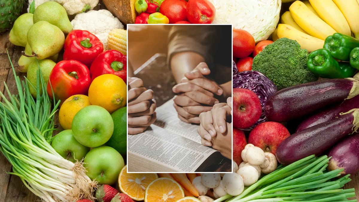 Fruits and vegetables in the background of a group of people praying over a Bible