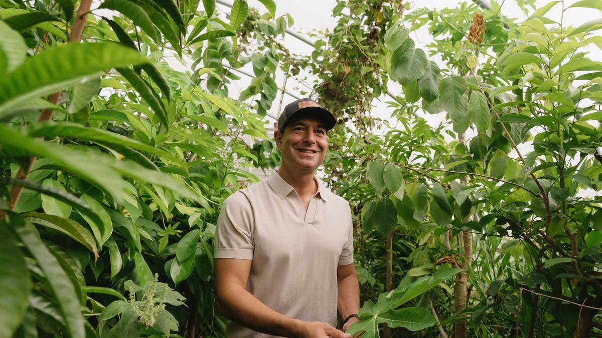 Jordan Rubin surrounded by greenery
