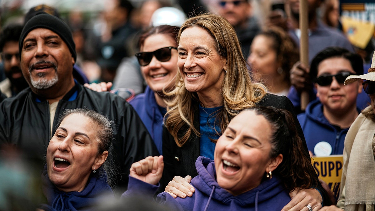 Mikie Sherrill poses with supporters