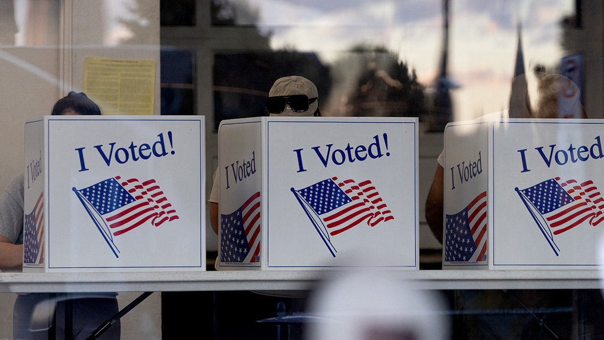 Voters casting ballots
