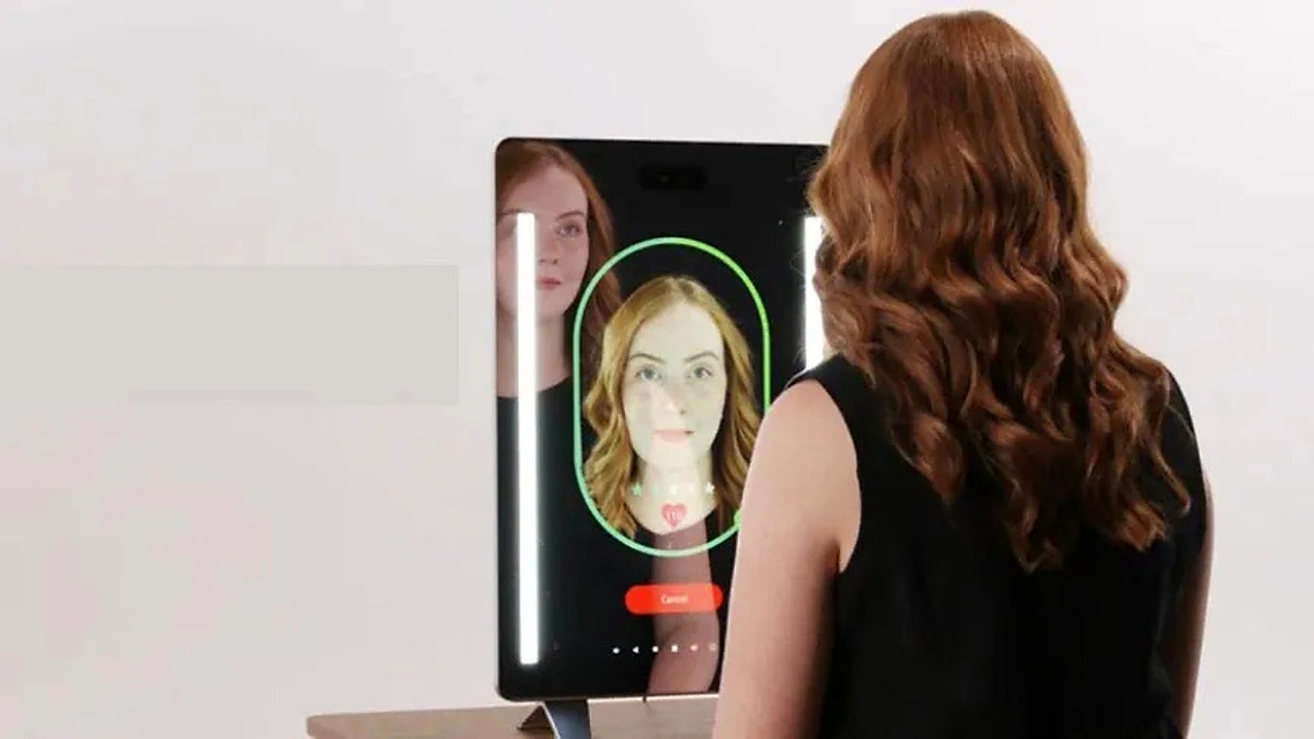 Girl staring at a NuraLogix AI-powered mirror.
