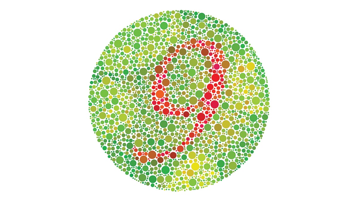 colorblindness test of the number nine in red surrounded by green dots