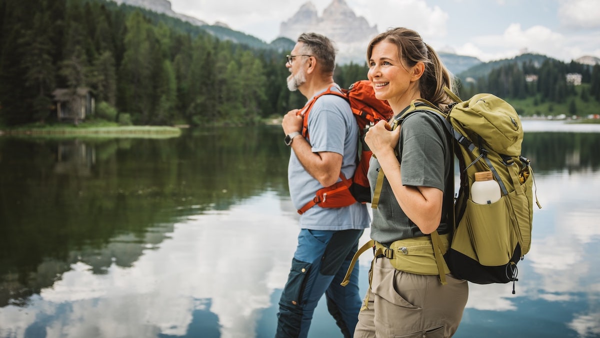 Mature couple hiking in the mountains