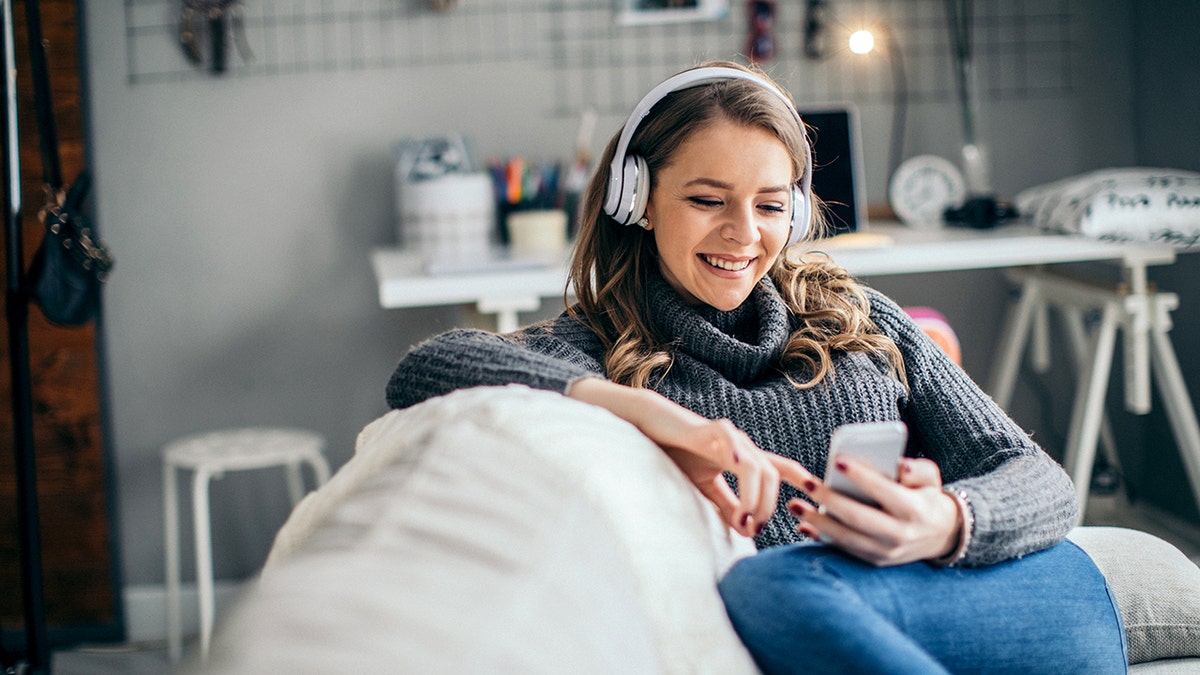 Woman listening to a podcast or music