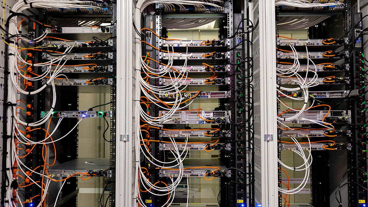 Data servers are shown with wires sticking out of them.