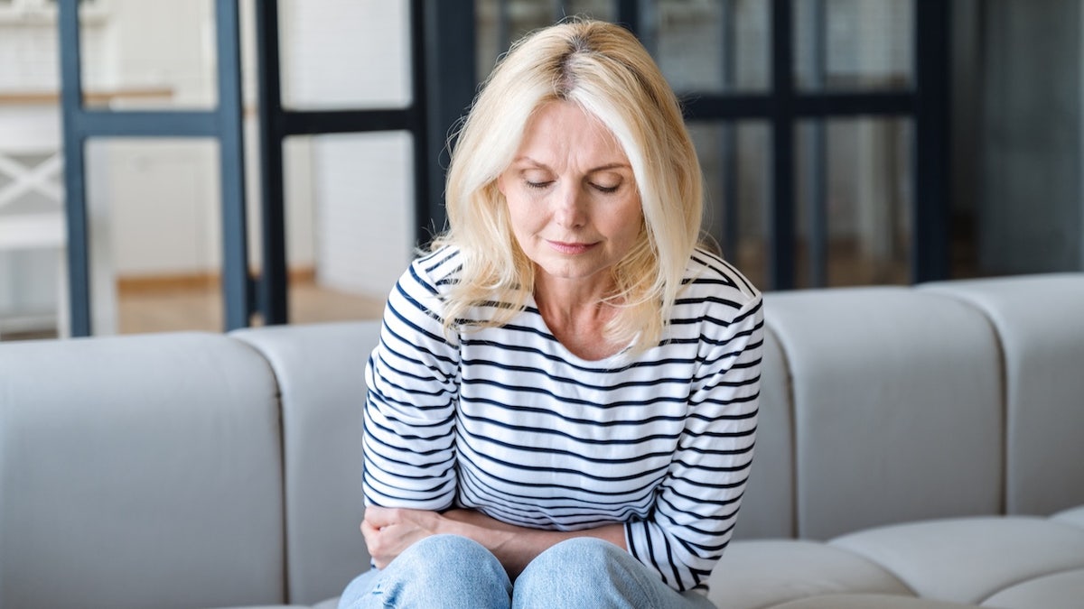 Woman with stomach pain