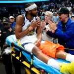 Warriors’ Moses Moody stretchered off with gruesome injury in overtime win