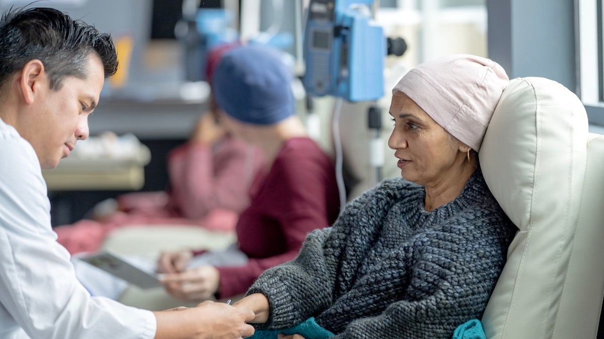 Female cancer patient receiving treatment