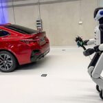 BMW puts humanoid robots to work building EVs