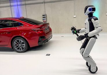 BMW puts humanoid robots to work building EVs