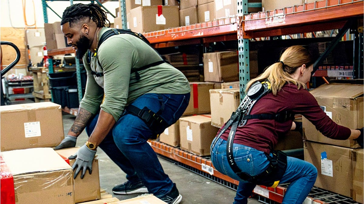 People lifting boxes